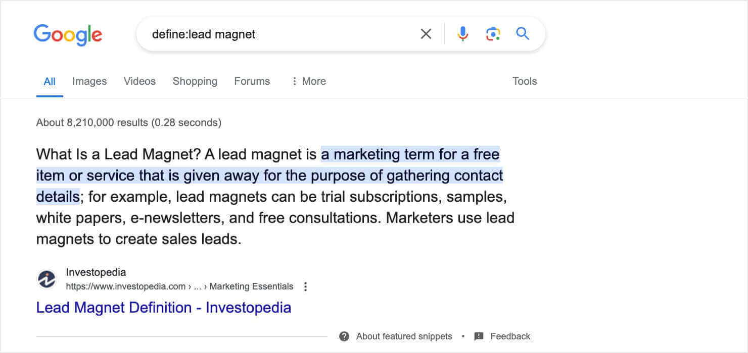 A Google search results page for the query "define:lead magnet," showing a featured snippet from Investopedia that defines the term.