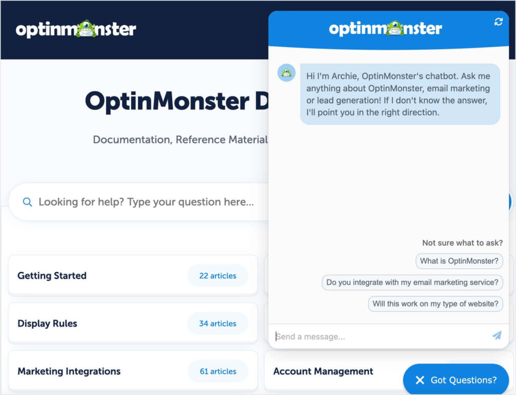 Chatbot on OptinMonster's site that  greets the visitors and offers to answer questions. Above the "Send a message" field, there are suggested questions, such as "What is OptinMonster?" and "Do you integrate with my email marketing service?"